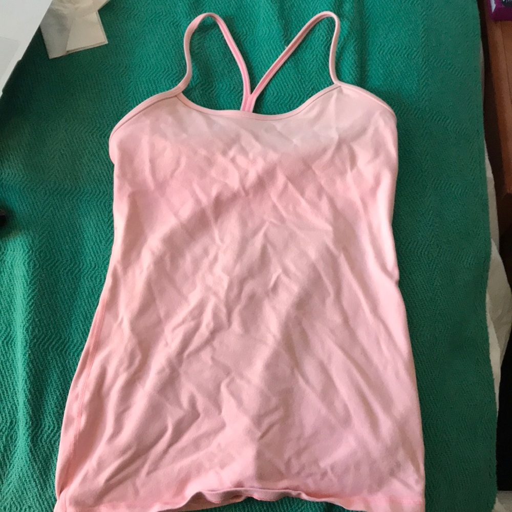 Pink Lululemon razor back tank with built in bra.